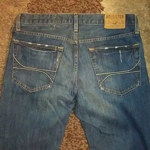Men's button fly Hollister jeans.
